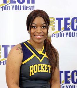 Young black girl in cheer uniform