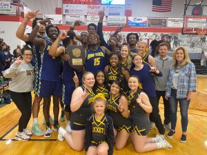 college basketball team and cheerleaders after winning championship