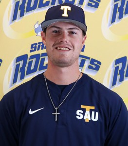 Man in blue shirt and baseball cap