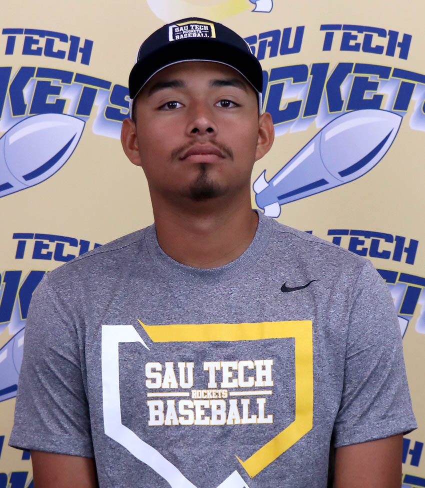 Young Hispanic man in cap and gray t-shirt