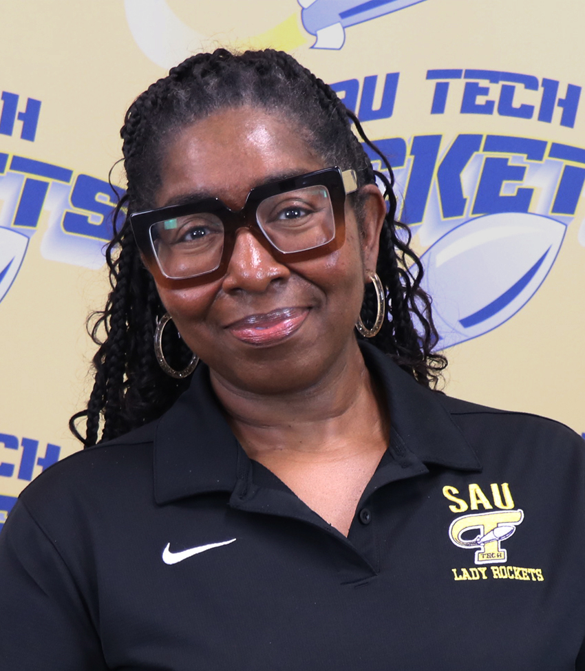 African American woman in black polo shirt