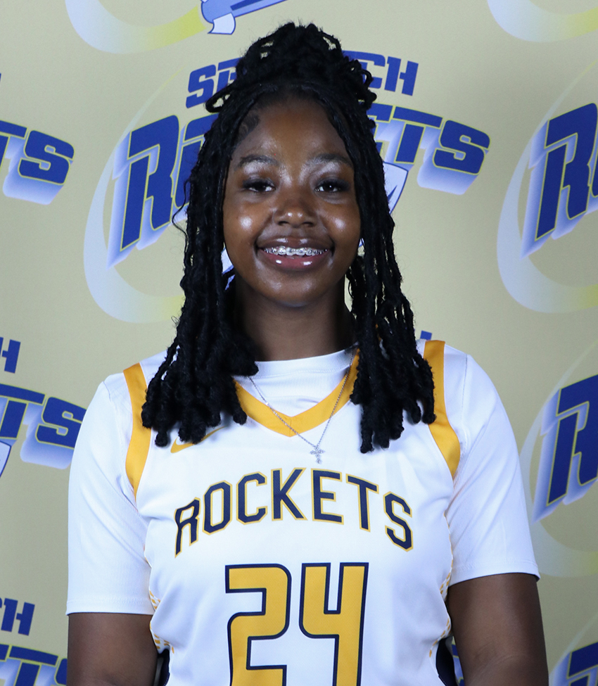 Young African American Woman in White Jersey Number 24