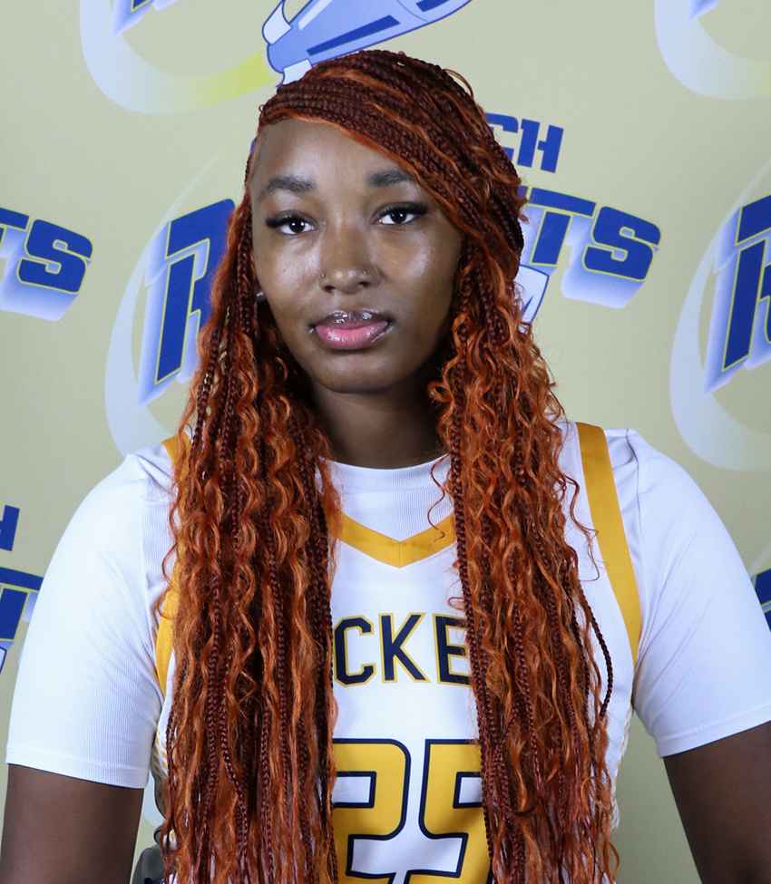 Young African American Woman in White Jersey Number 25