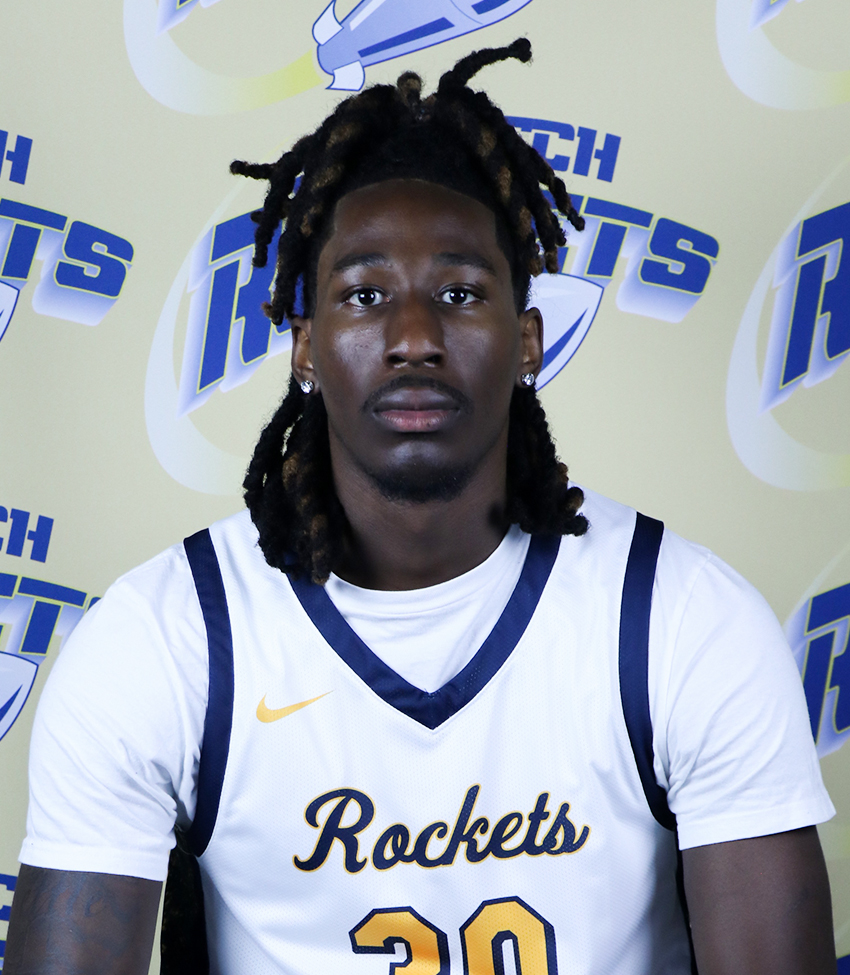 Young African American Man in White Jersey Number 30