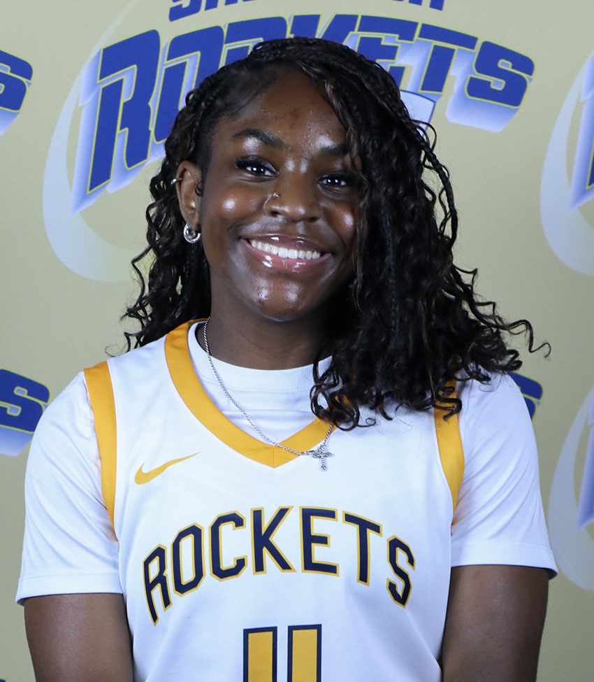 Young African American Woman in White Jersey Number 4