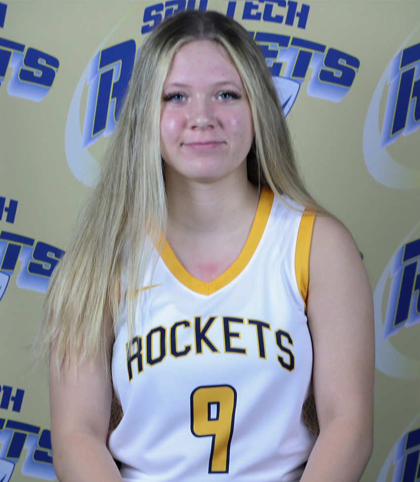 Young White American Woman in White Jersey Number 9