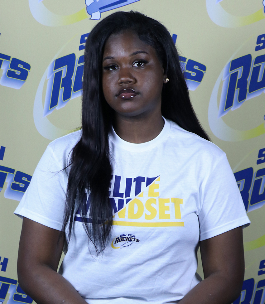 Young African American Woman in White Shirt